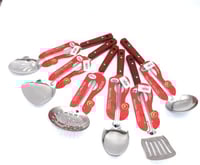 ملاعق طبخ بيد خشب