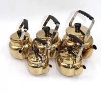 ارتقِ بتجربة تحضير الشاي مع أباريق استيل الذهبية م...