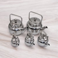 ابريق شاي استانلس استيل بمقبض اتسيل