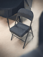 كرسي اسود قابل للطي اواني ماس
