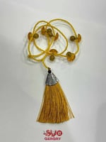 تركيبات عظم من ازراري باللون الاسود