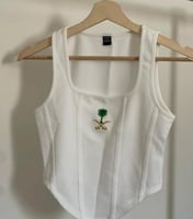 توب بتطريز سيفين ونخلة