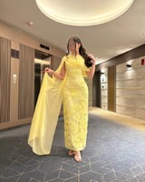 فستان سهرة اصفر بتصميم فاخر و لمسة ملكية