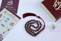 سبحة العود-شفافة - بكلايت - بكركوشه ، مع خيط عنابي...