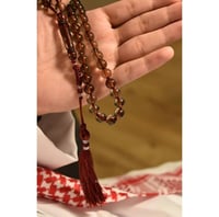 سبحة العود-شفافة - بكلايت - بكركوشه ، مع خيط عنابي...