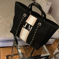 شنطة ناڤا كبير-اسود ( تخصيص الحروف )