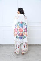 بلوزة واسعة غير متماثلة الطول