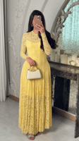 فستان دانتيل أصفر بأكمام طويلة
