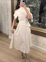 تنورة كتان بقصة مائلة