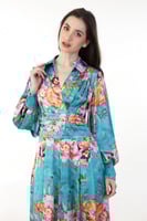 جمبسوت مشجر تركواز بقصّة لف وياقة قلاب