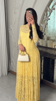فستان دانتيل أصفر بأكمام طويلة