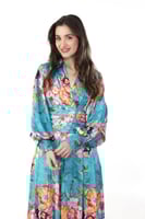 جمبسوت مشجر تركواز بقصّة لف وياقة قلاب