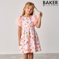 فستان بناتي وردي ناعم بنقوش زهرية – تصميم أنيق لعم...