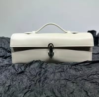 حقيبة يد نسائية بمقابض علوية