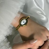 ساعة Baignoire ذهبي