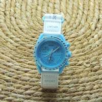 ساعة أطفال لون سماوي وأبيض