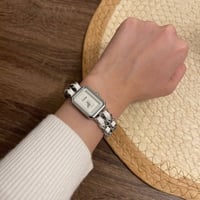 ساعة نسائية جلد & معدن سيلفر