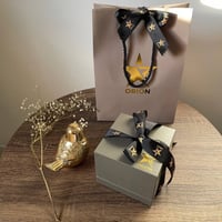 ساعة نسائية ذهبية بأرقام عربية مينا أبيض