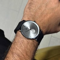 ساعة رجالية لون أسود ميناء فضي جلد