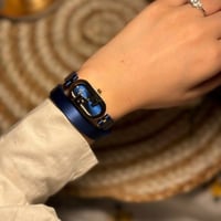 ساعة نسائية مستطيلة ازرق و ذهبي