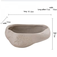 وعاء زهور من السيراميك المعتق