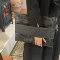 باوتش جلد اسود مع مسكه