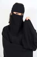 طاقية نص الرأس بلثمة