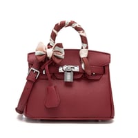 شنطة نسائية لون عنابي من لادون