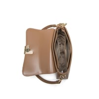 شنطة نسائية لون جملي من لادون