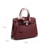 شنطة نسائية لون عنابي من لادون