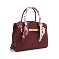 شنطة نسائية لون عنابي من لادون