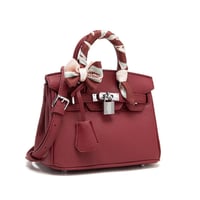 شنطة نسائية لون عنابي من لادون