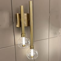 أبليك جداري ذهبي مزدوج – تصميم أسطواني زجاجي – ضوء...