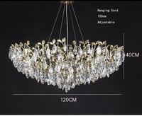 ثرياء علاقي كرستال ذهبي تصميم عصري متوفر بمقاسات