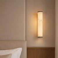 ابليك جداري رخامي بإطار أسود – إضاءة صفراء دافئة –...