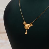 عقد كرسي جابر ذهب عيار 21