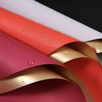 تغليف ورد بلاستك وجهين الوان داخلي ذهبي