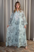 جلابية بلون أخضر مائي بنقشة زهرية ناعمة وتصميم أني...