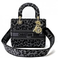 حقيبة كريستيان ديور جلد نمر أسود ورمادي