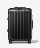 شنطة سفريات بعجلات ريموا سويت كيس لون أسود