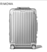 حقيبة سفر بعجلات ريموا سويت كيس لون فضي