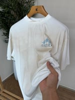 تي شيرت أميري ستاربرست رجالي لون ابيض طبعة أزرق