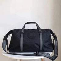 حقيبة سفر بربري لون أسود