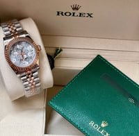 ساعة يد روليكس برونزية وفضية بتفاصيل مميزة