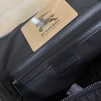 حقيبة سفر بربري لون أسود