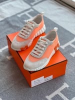 سنيكر هيرميس نسائي باونسينغ لون لايت اورانج مميز