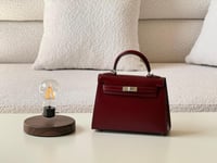 شنط يد ايرميز كيلي سيلر بلون برغندي عصري مع معدن ف...