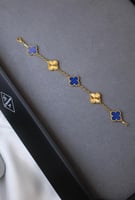 إسوارة فان كليف زهرة الهامبرا الشهيرة لون ذهبي وني...