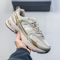 نيوبالنس530 شوز رباضة شبكي للجنسين لون كريم بيج