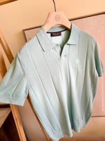 قميص بولو لوروبيانا رجالي بلون أخضر